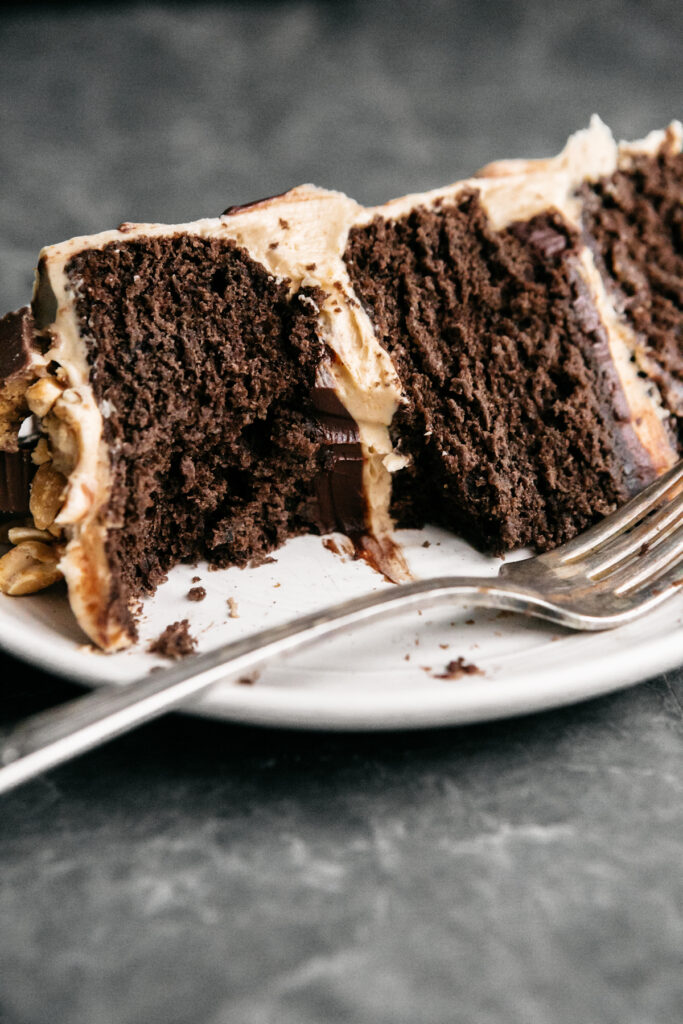 A slice of cake on a white plate 