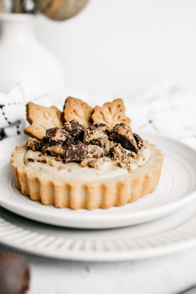 peanut butter mousse tart with shortbread cookie leaves