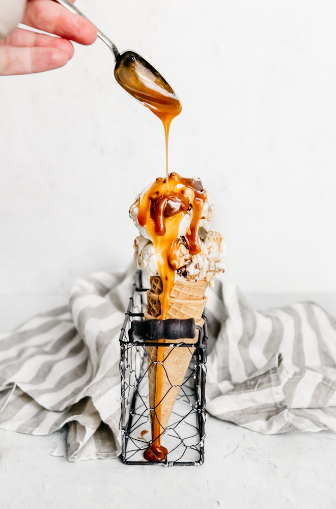 No Churn Snickers Ice Cream with a Caramel Drizzle