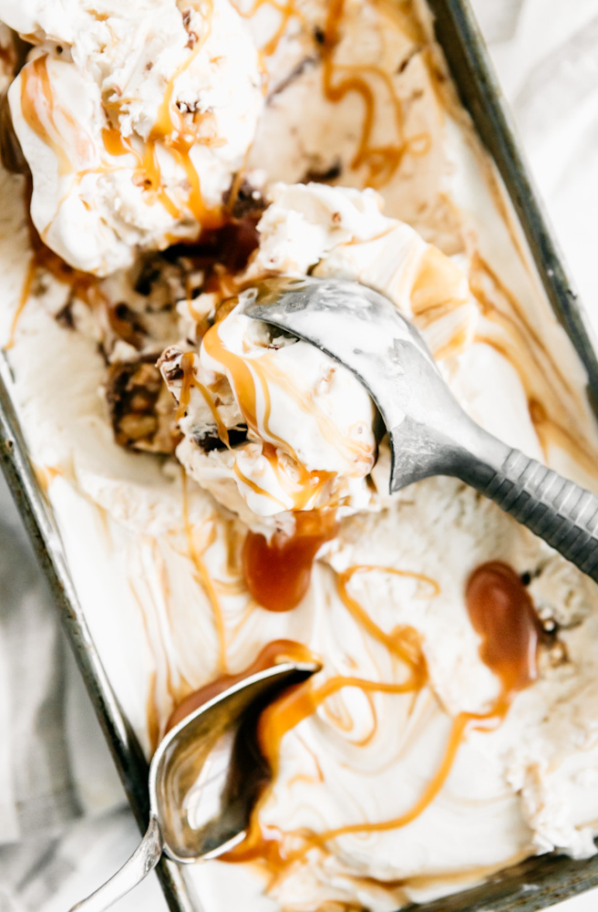 No Churn Snickers Ice Cream with a Caramel Ripple