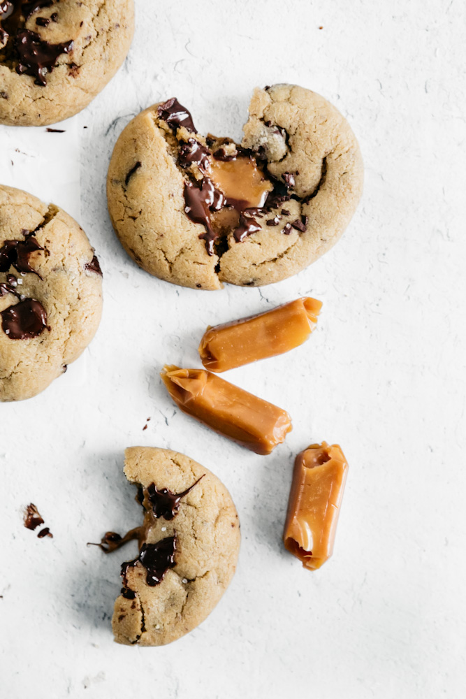adding soft caramel to cookies