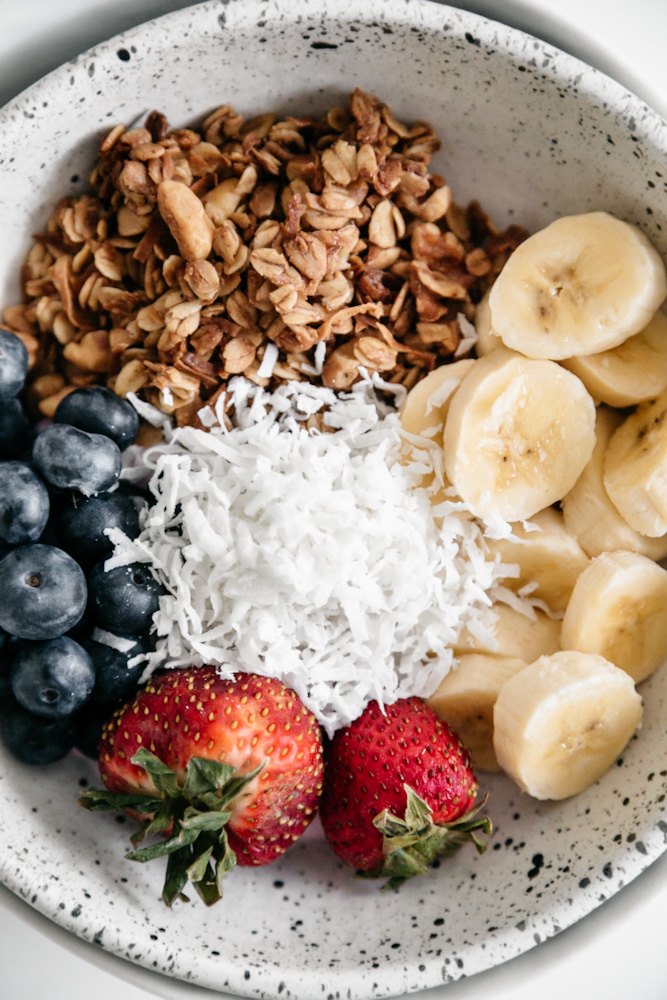 Breakfast bowl with wholesome vanilla walnut granola and fruit. 