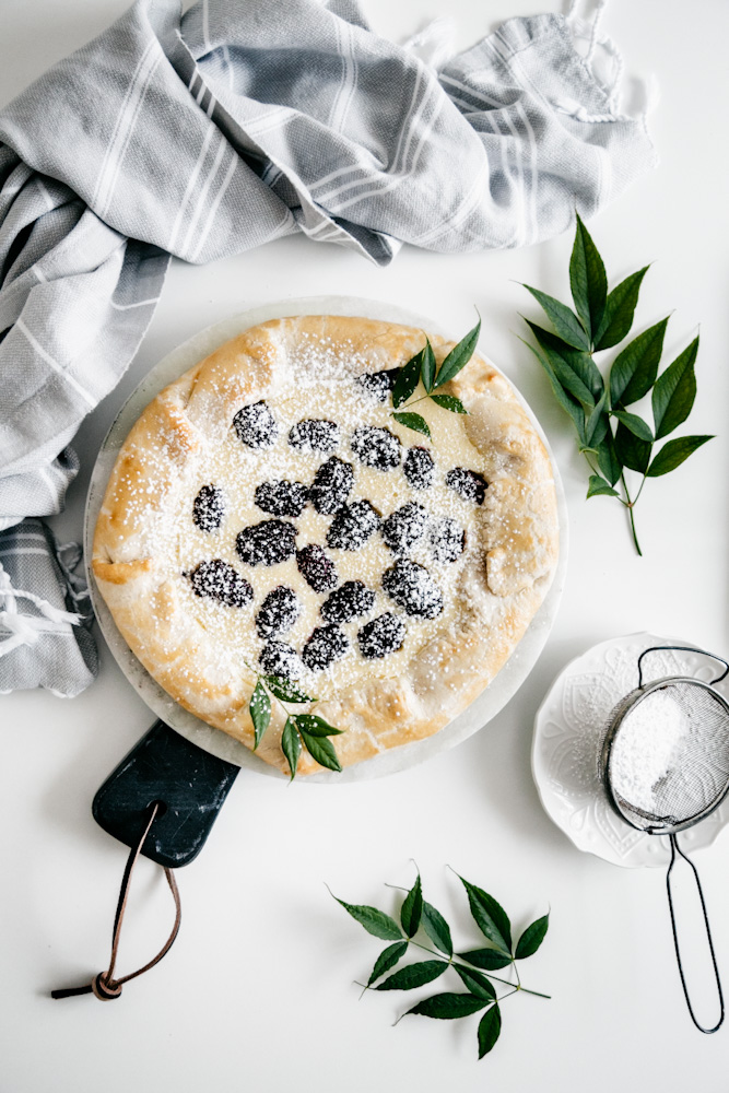 Aerial shot of galette with powdered sugar. 