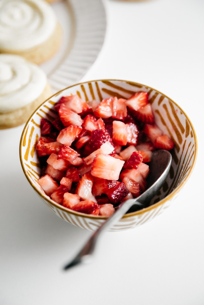 A bowl of diced strawberries. 
