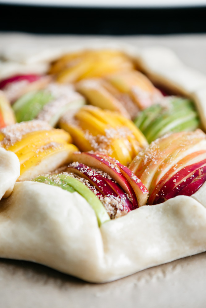 Closeup of sugar dusted apples on a pie crust 