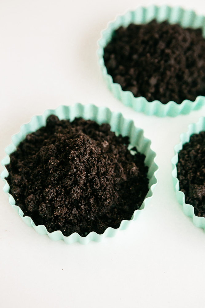 Oreo crumbs in little tart pans