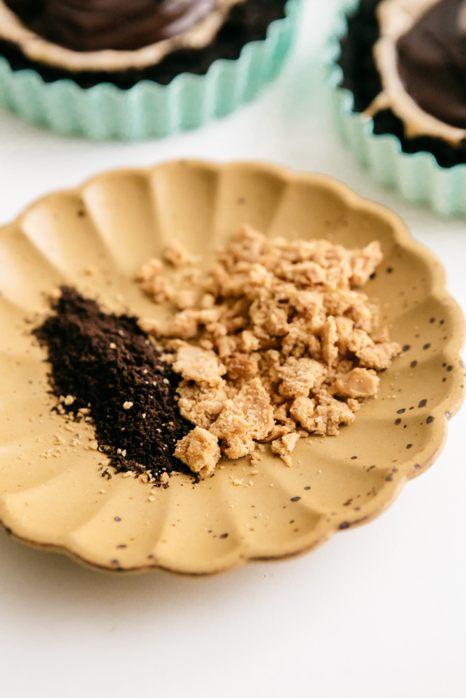 Cookie crumbs to top tarts with 