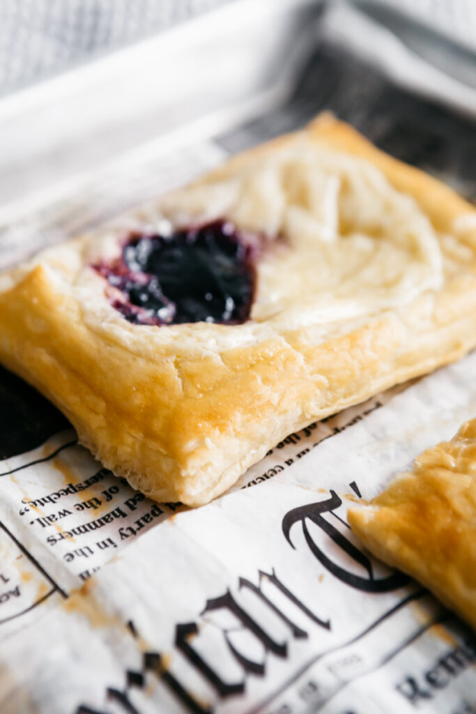 A closeup of a Lemon Blueberry Cheesecake Danish