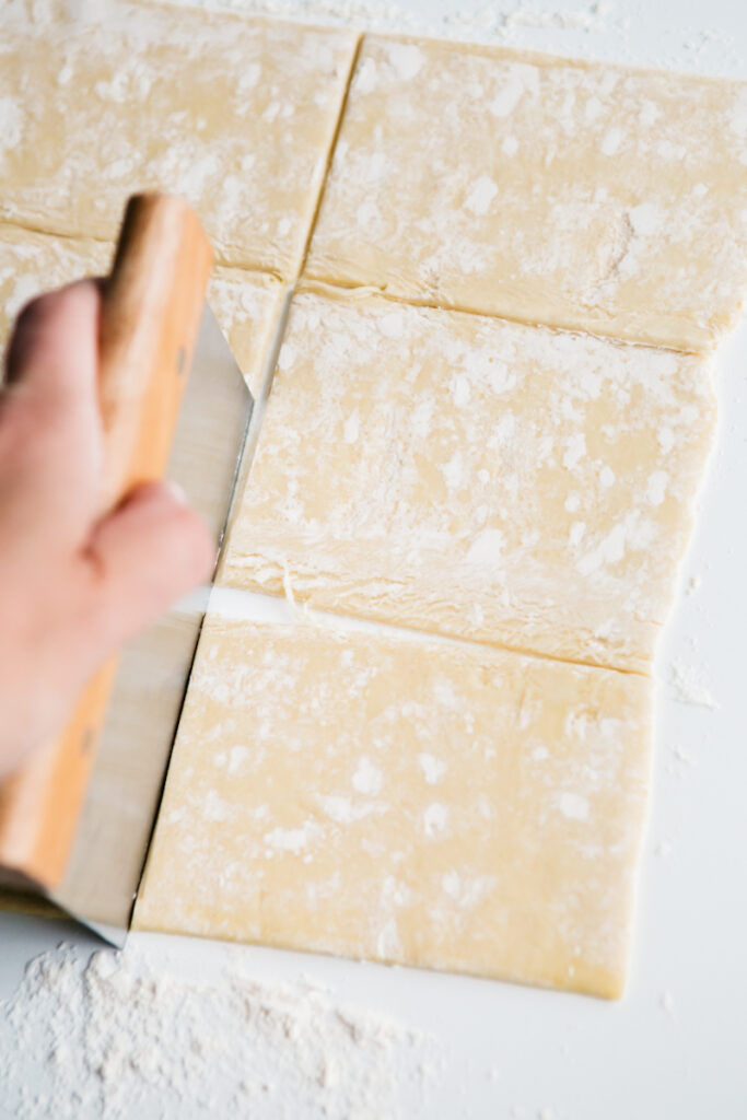 Cutting puff pastry into rectangles 