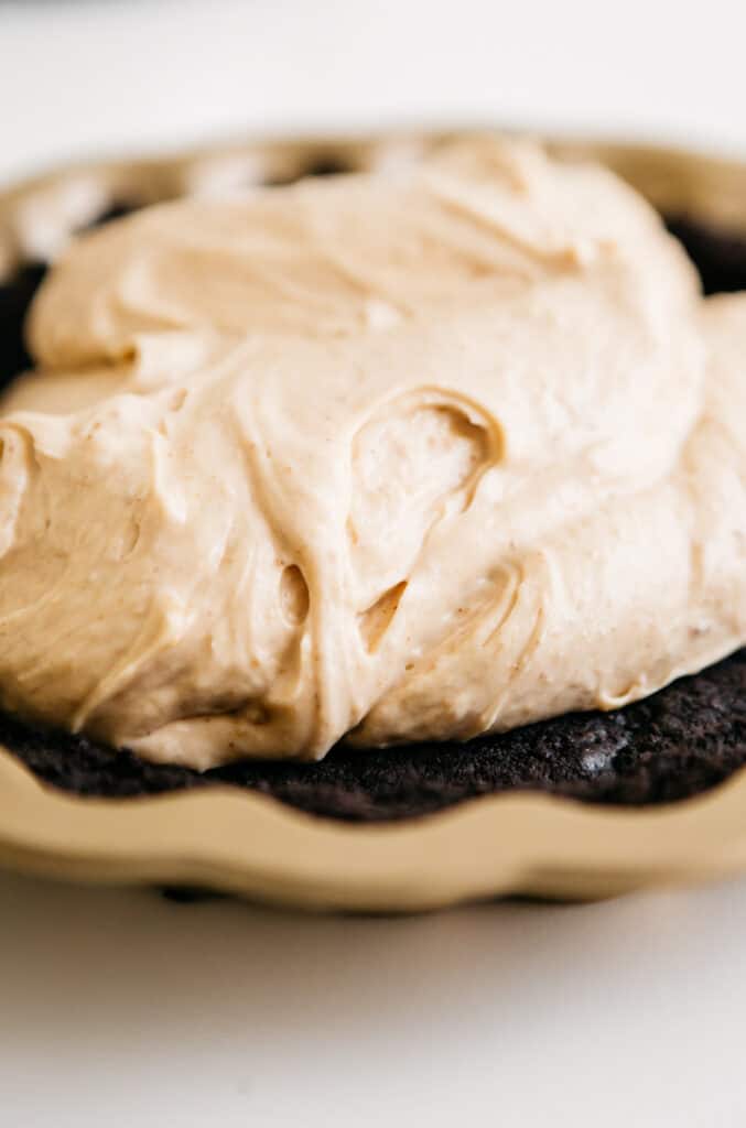Closeup of peanut butter filling inside a pie 