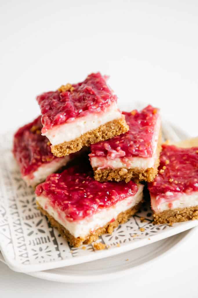 A plate of Raspberry Cheesecake Bars 
