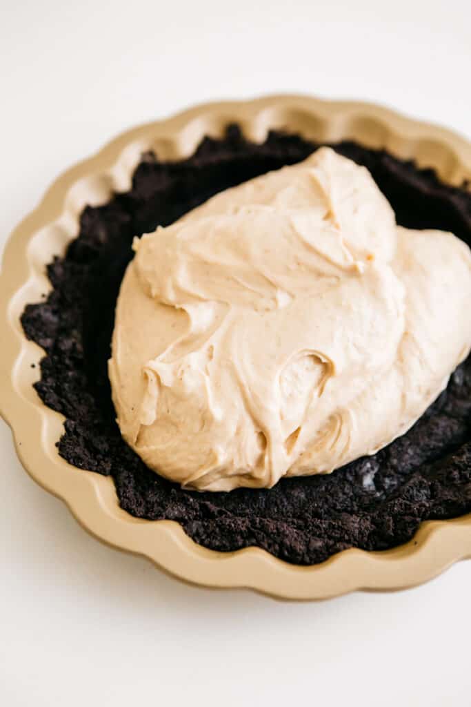 Peanut butter filling inside of oreo pie 