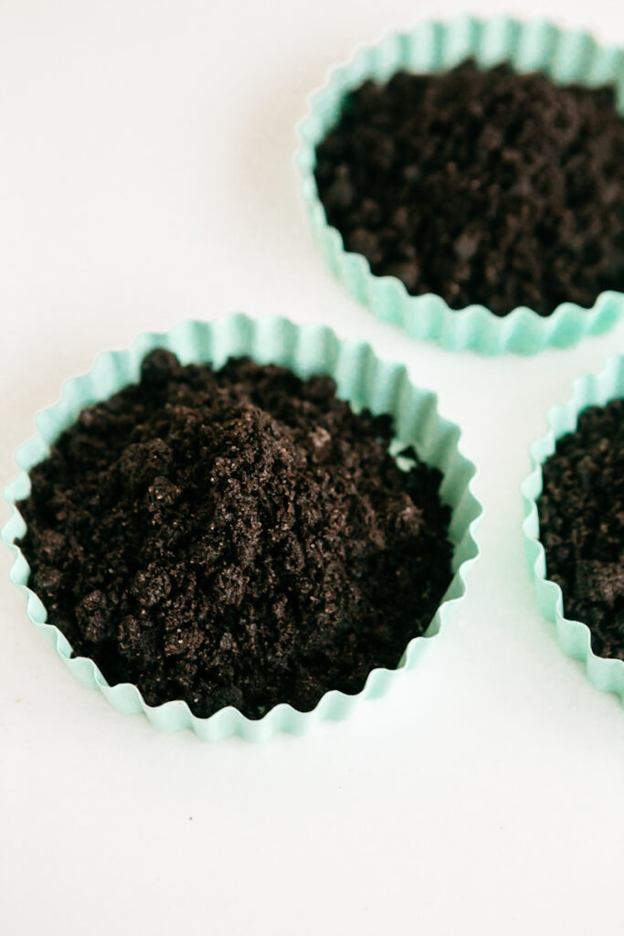 Oreo crust in 3 tart pans 