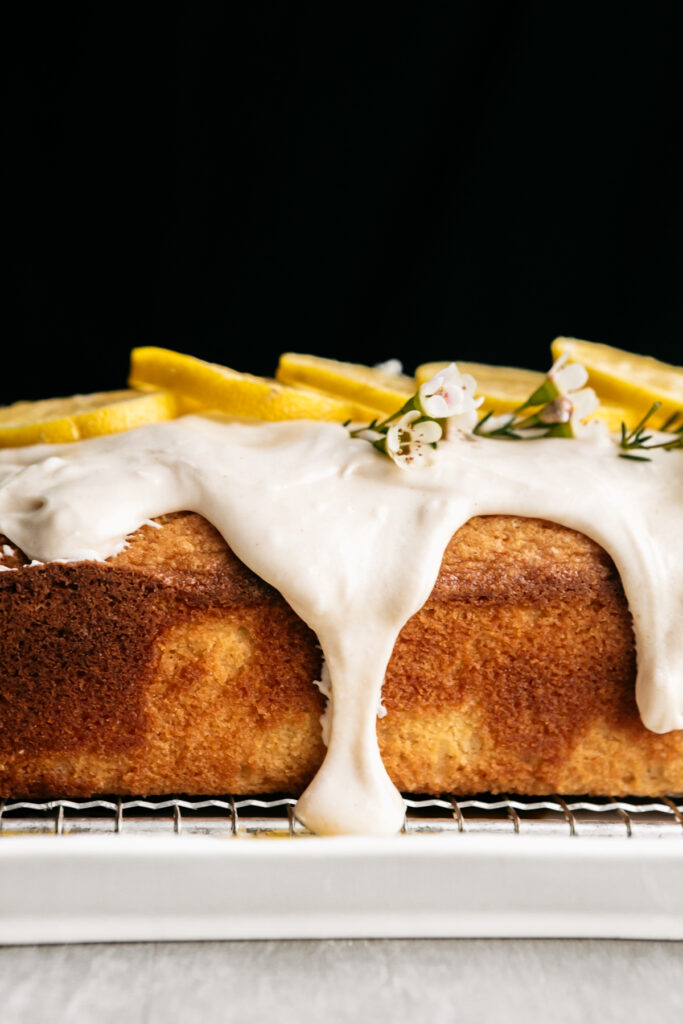 Side view of a pound cake with drizzle 