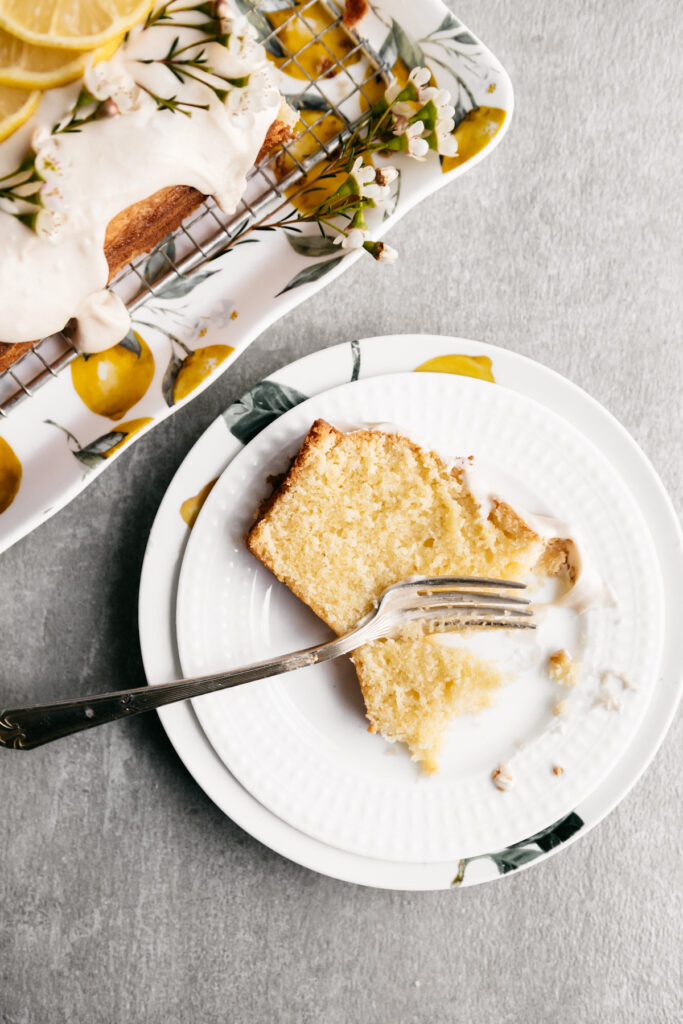 A slice of lemon pound cake on a plate 