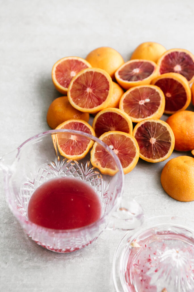 Blood orange juice in a glass pitcher 