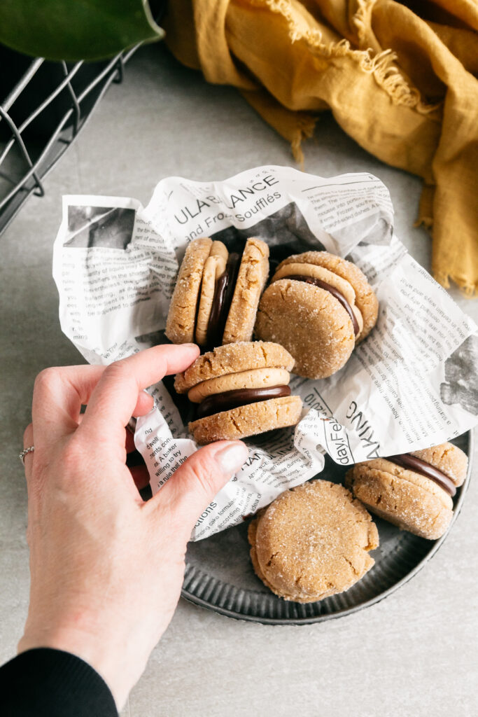 A small bowl of flourless peanut butter sandwich cookies 