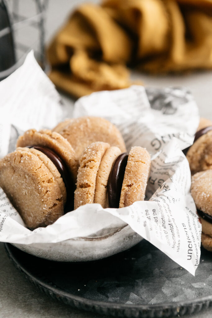 A small bowl of flourless peanut butter sandwich cookies 