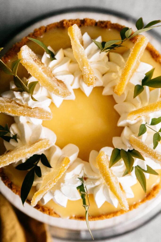 Closeup of the top of a lemon cheesecake 