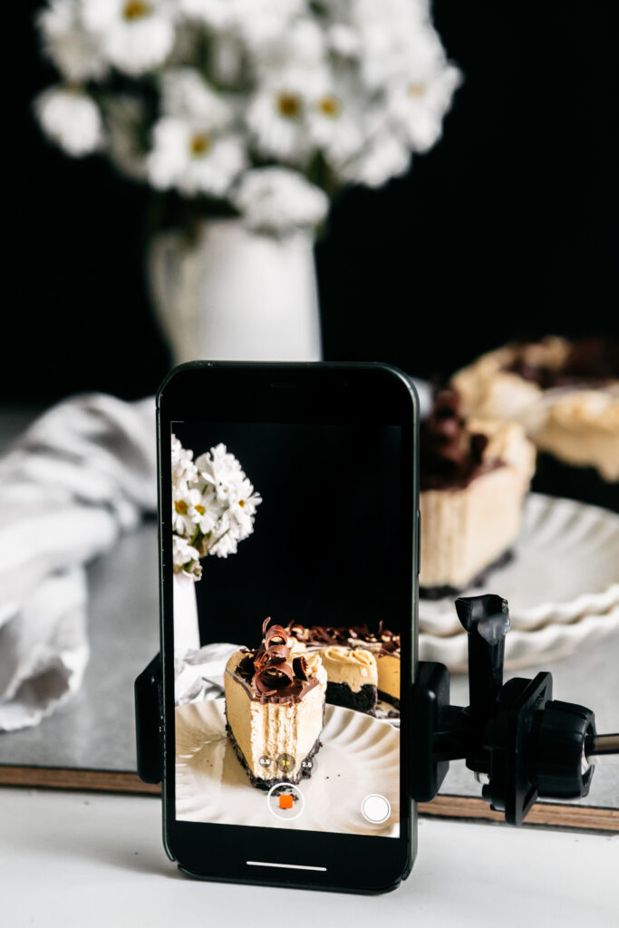 A phone recording a Cheescake video 