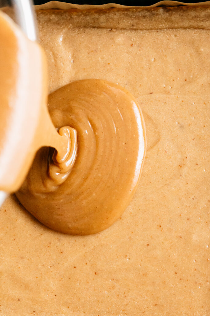 Pouring peanut butter ganache 