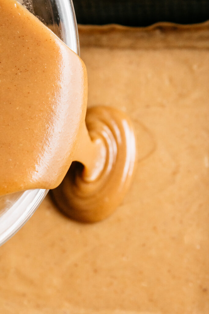 Pouring peanut butter ganache 