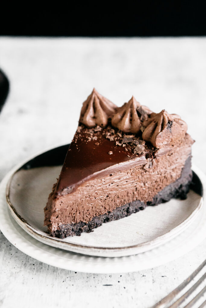 A slice of Ultimate No-Bake Chocolate Cheesecake