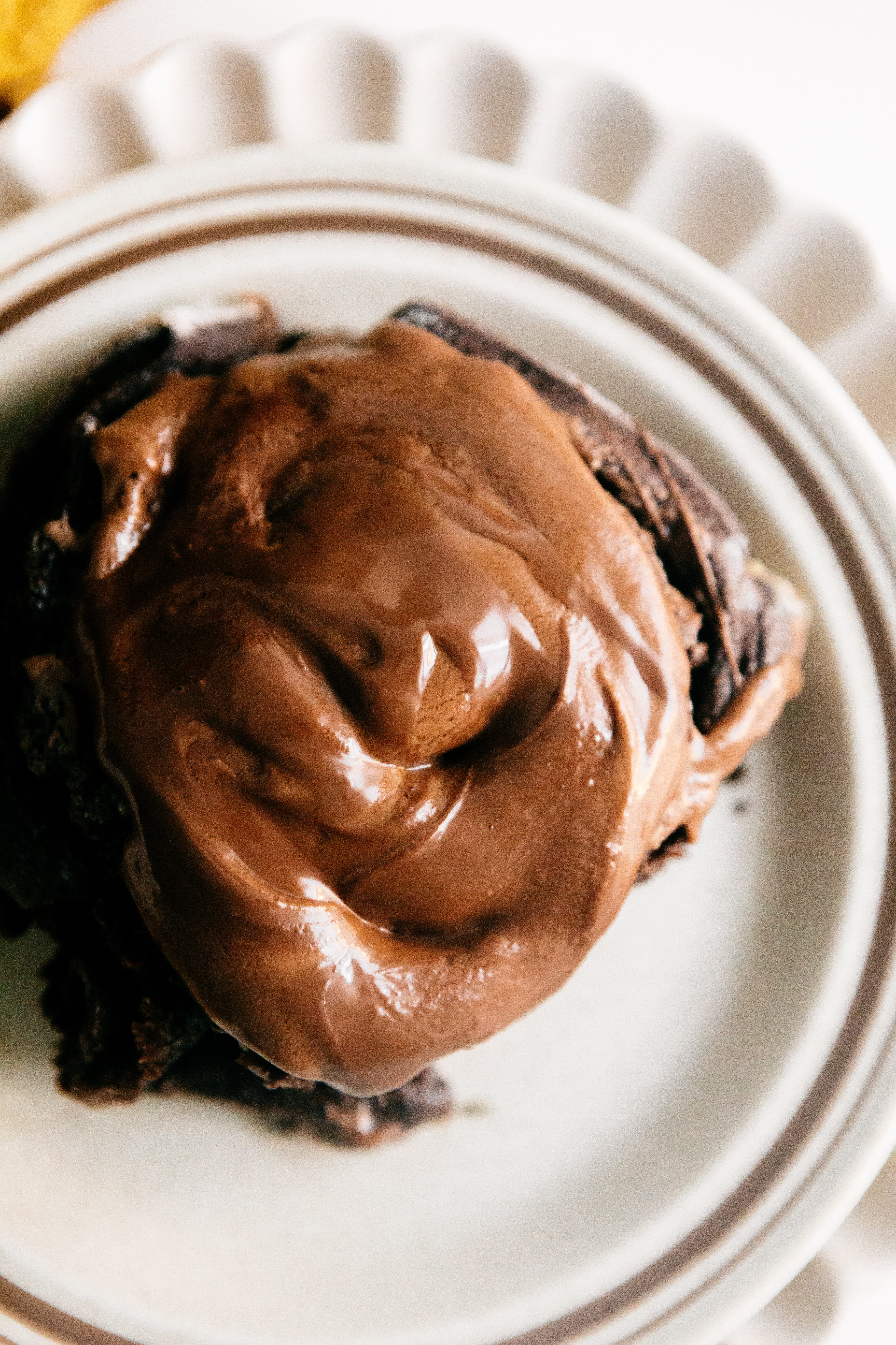 A nutella cinnamon roll on a plate 