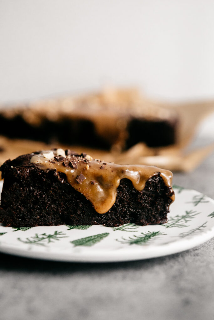 A slice of chocolate cake with peanut butter ganache 