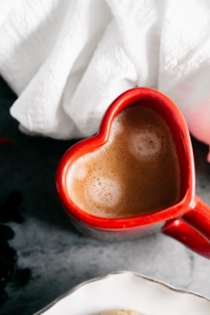 Red heart mug of coffee 