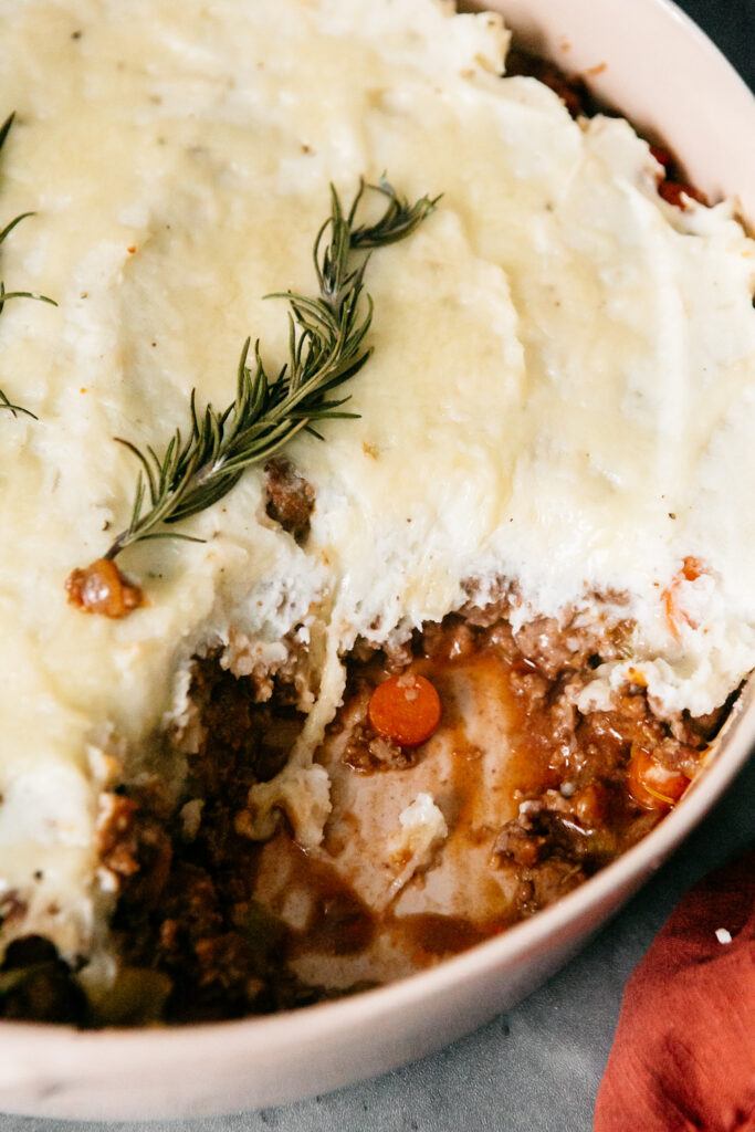 Easy Homemade Shepherd's Pie with a spoonful out of the dish 