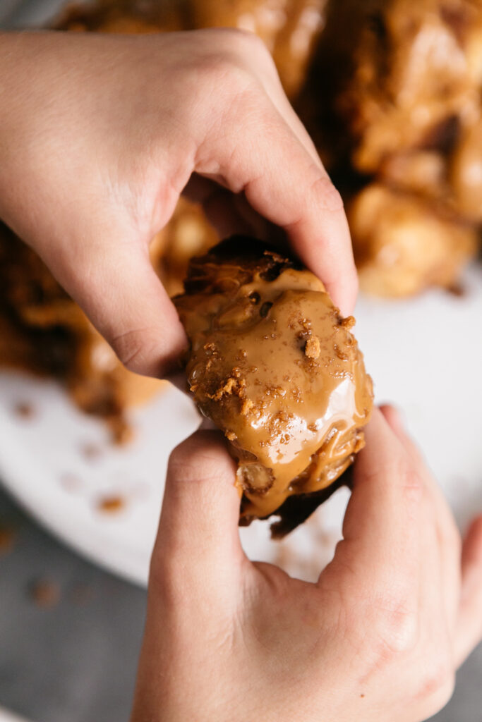 holding stuffed monkey bread 